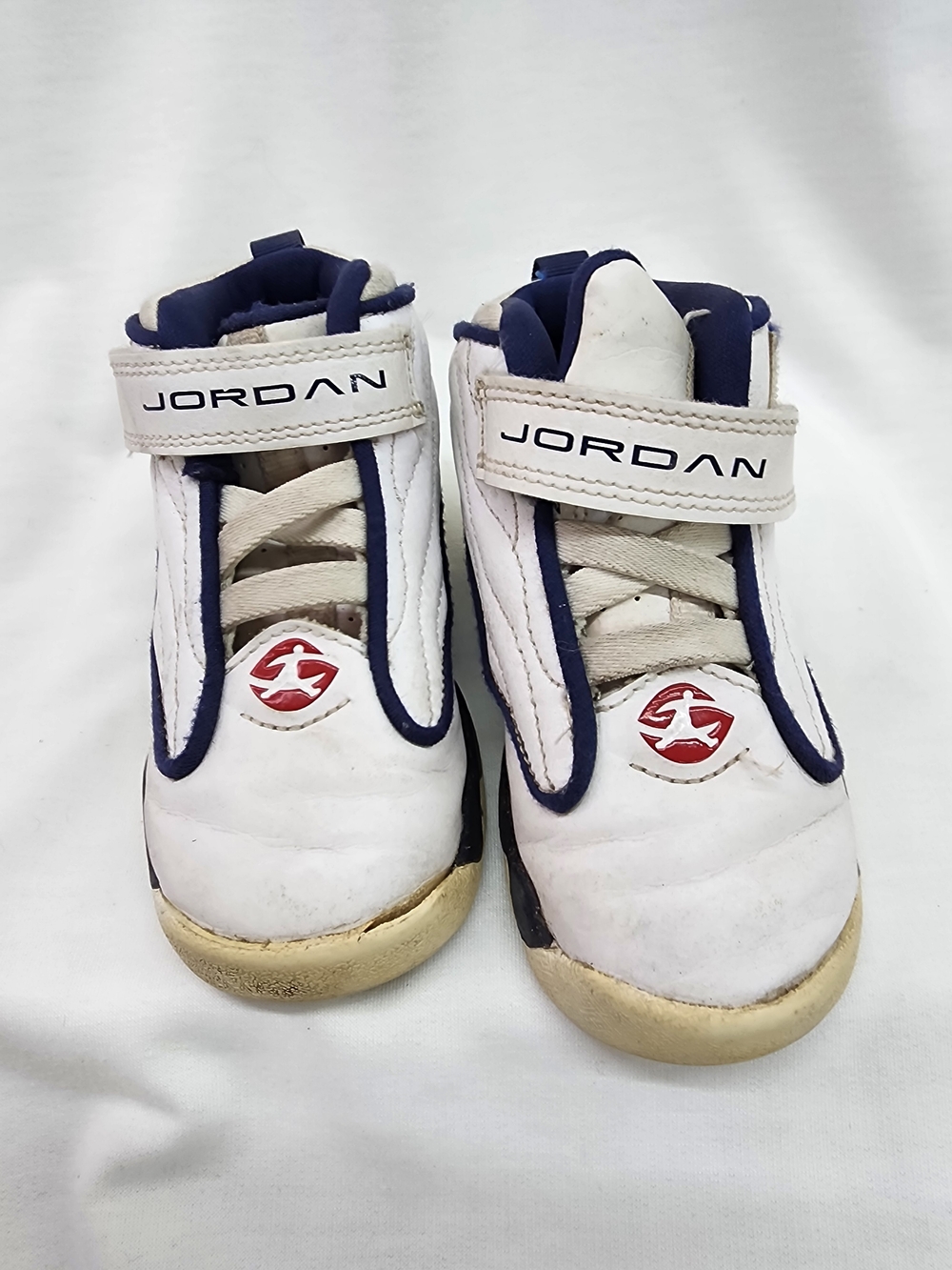 Jordan White and Navy Kids High-Top Sneakers with Red Logo